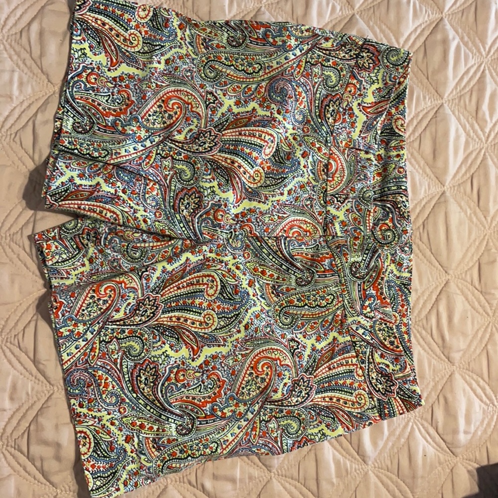 Very colorful patterned shorts.